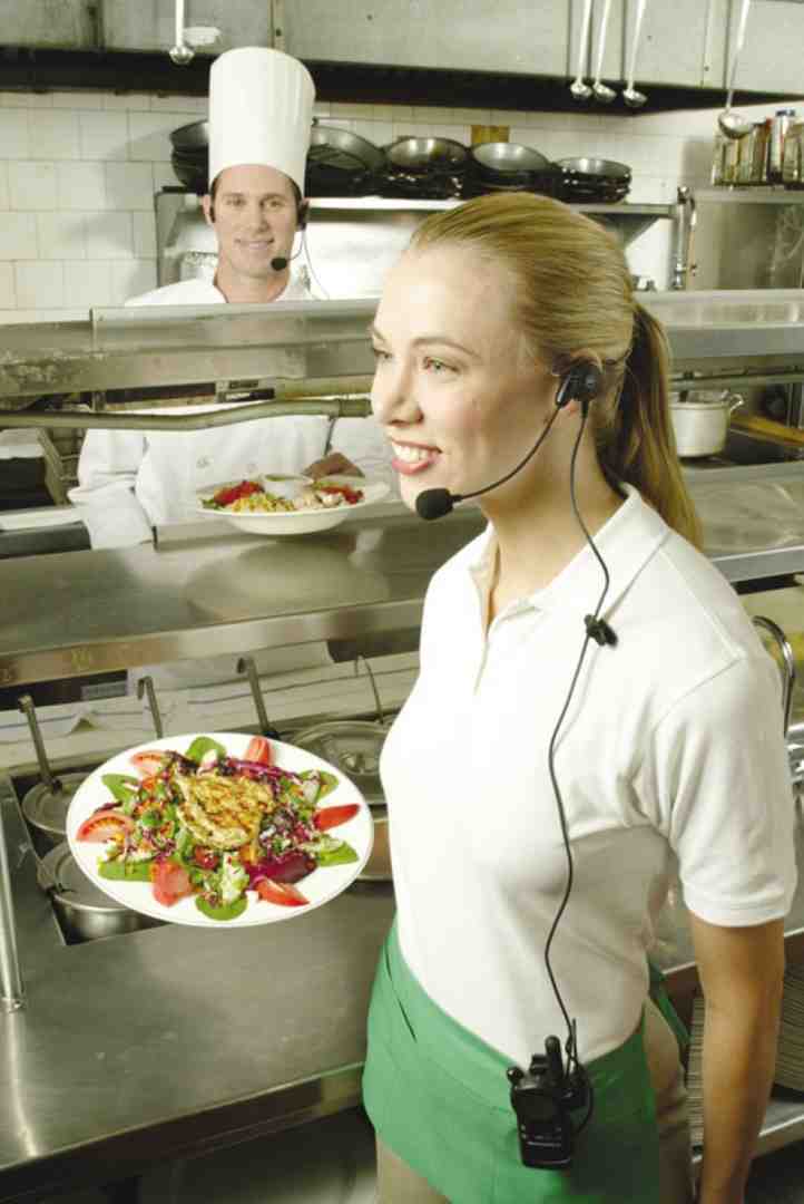 variety of radio types for different hospitality roles showing sleek radio for concierge and rugged radio for maintenance worker - hospitality radios (hotels, restaurants)