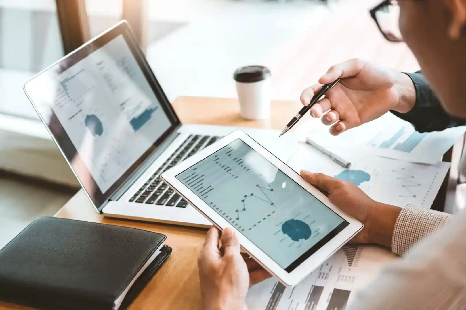 team collaborating on whiteboard with SEO ideas - organic search agency