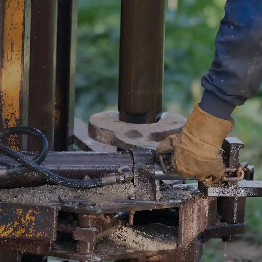 Emergency technician pulling submersible pump from well - fix well pump near me