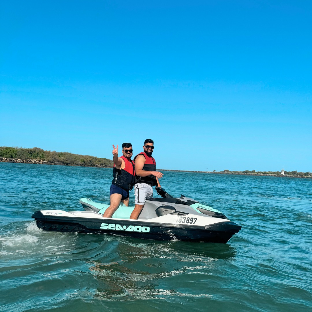 Surfers Paradise Jet Ski - two friends who rented a jet ski from Gold Coast Jet Ski having fun out on the water