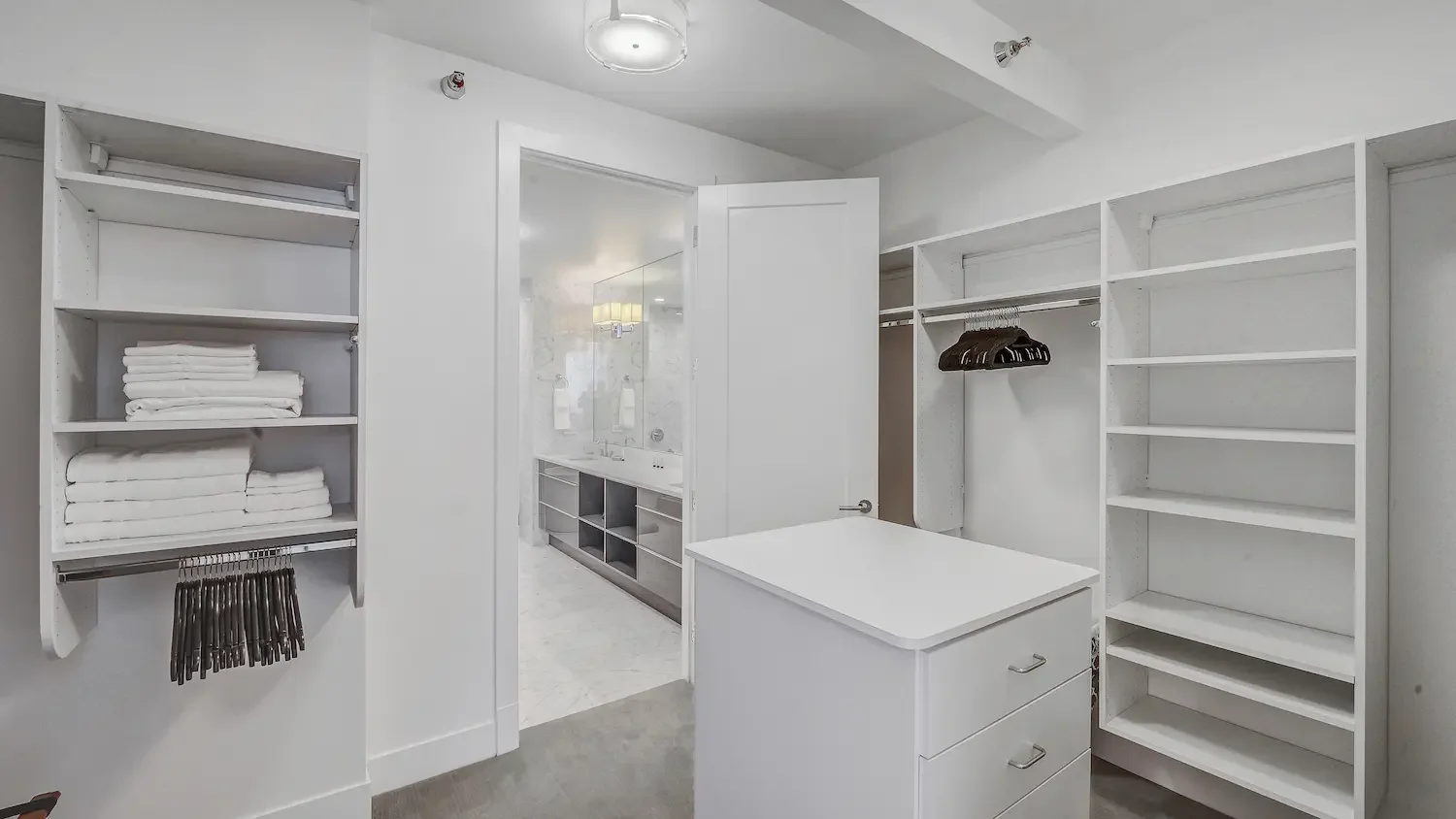 Fully equipped closet with bathroom in a Chicago corporate suite - move in ready apartments Chicago