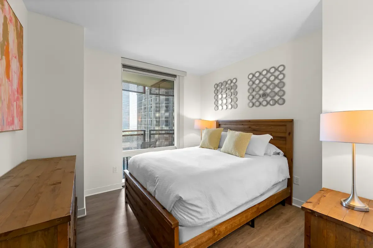 Modern luxury high-rise apartment bedroom in downtown Chicago
