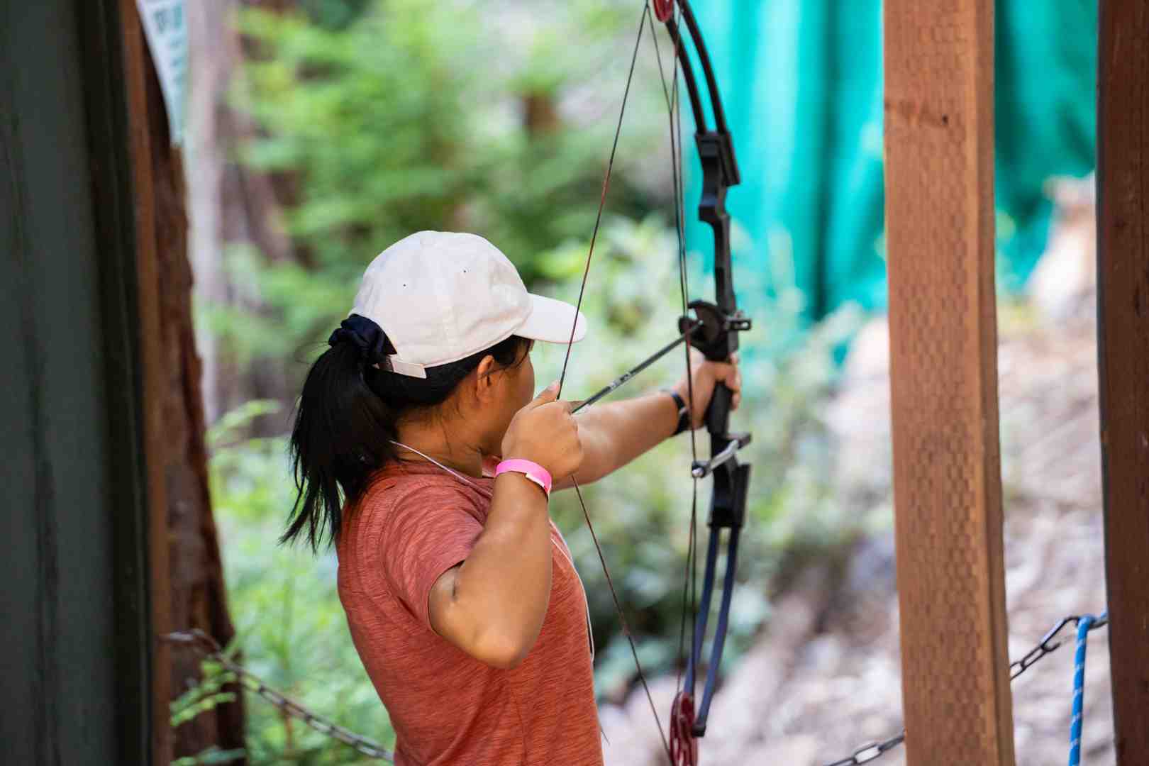 Young woman practicing archery in Sonoma County.