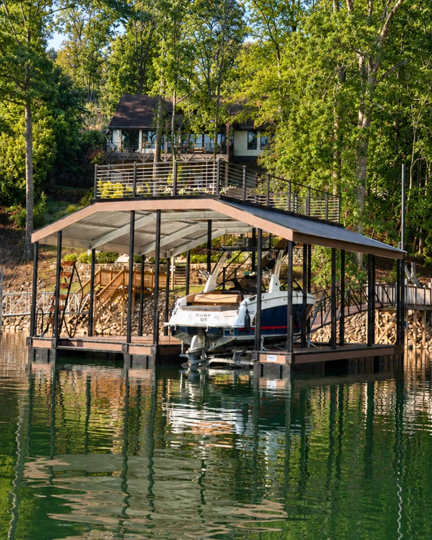 Professional marine contractor inspecting a custom aluminum dock frame in Hiawassee GA Professional marine contractor inspecting a custom aluminum dock frame in Hiawassee GA