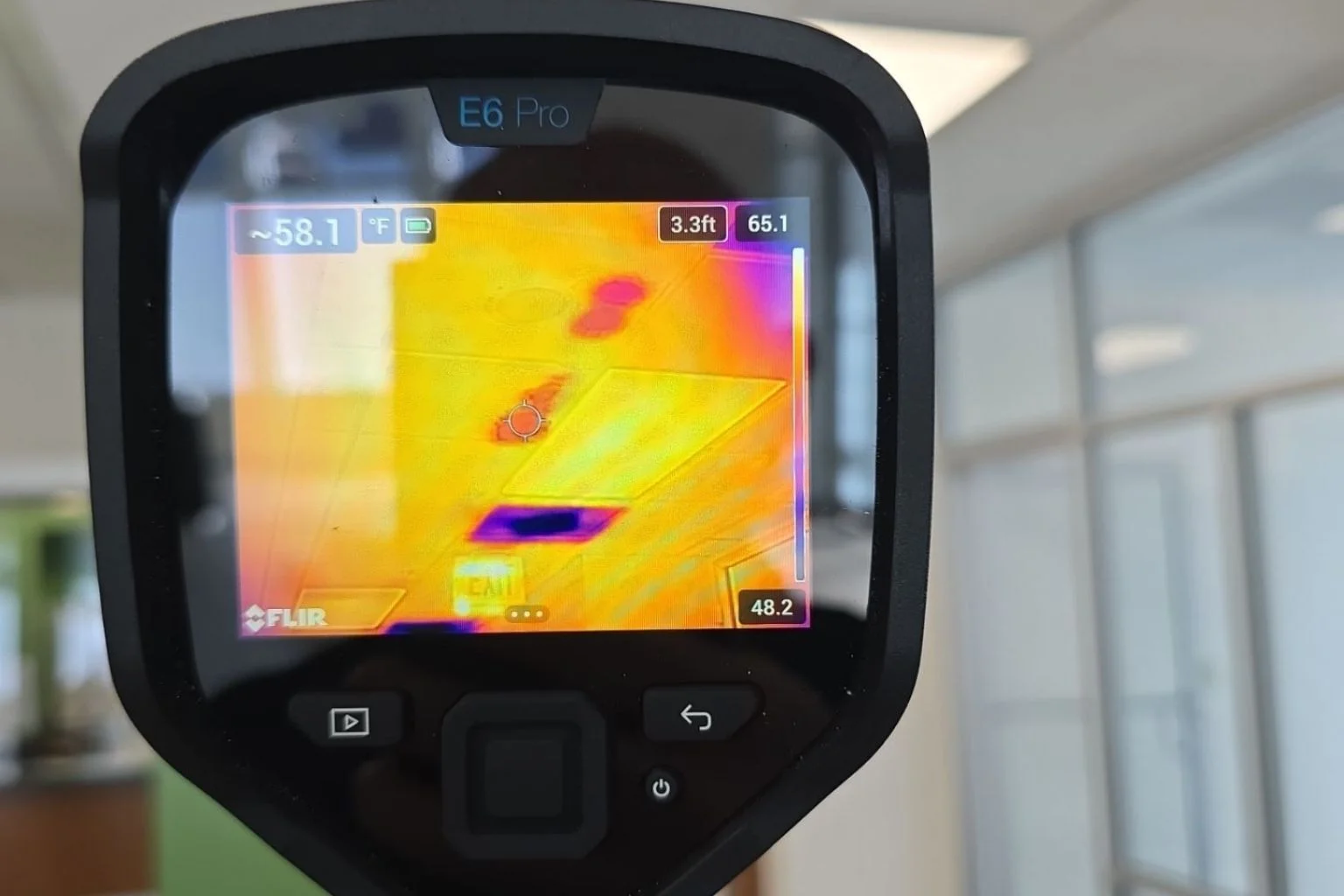 Thermal image showing ceiling leak and unaffected reference area for Florida water damage insurance claim documentation.