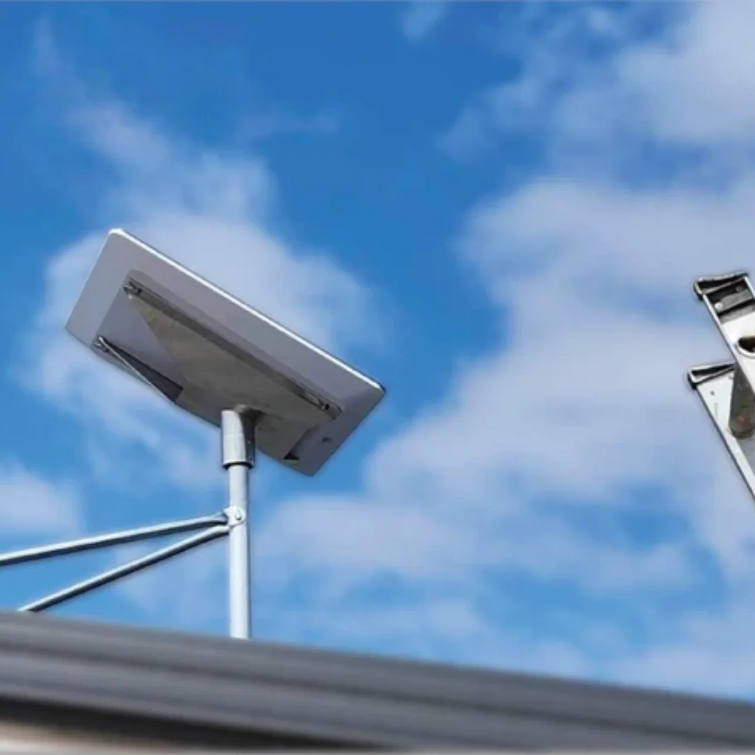Starlink dish mounted on Australian home roof during heavy rain and storm clouds - does satellite internet work in rain