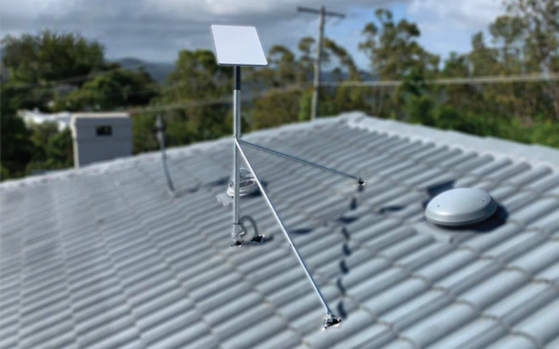 starlink dish securely mounted on a modern Australian tile roof with a clear sky view - how to install starlink on tile roof