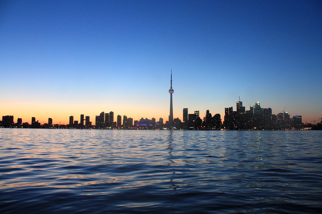Toronto skyline at sunset; photo credit: brigachtal