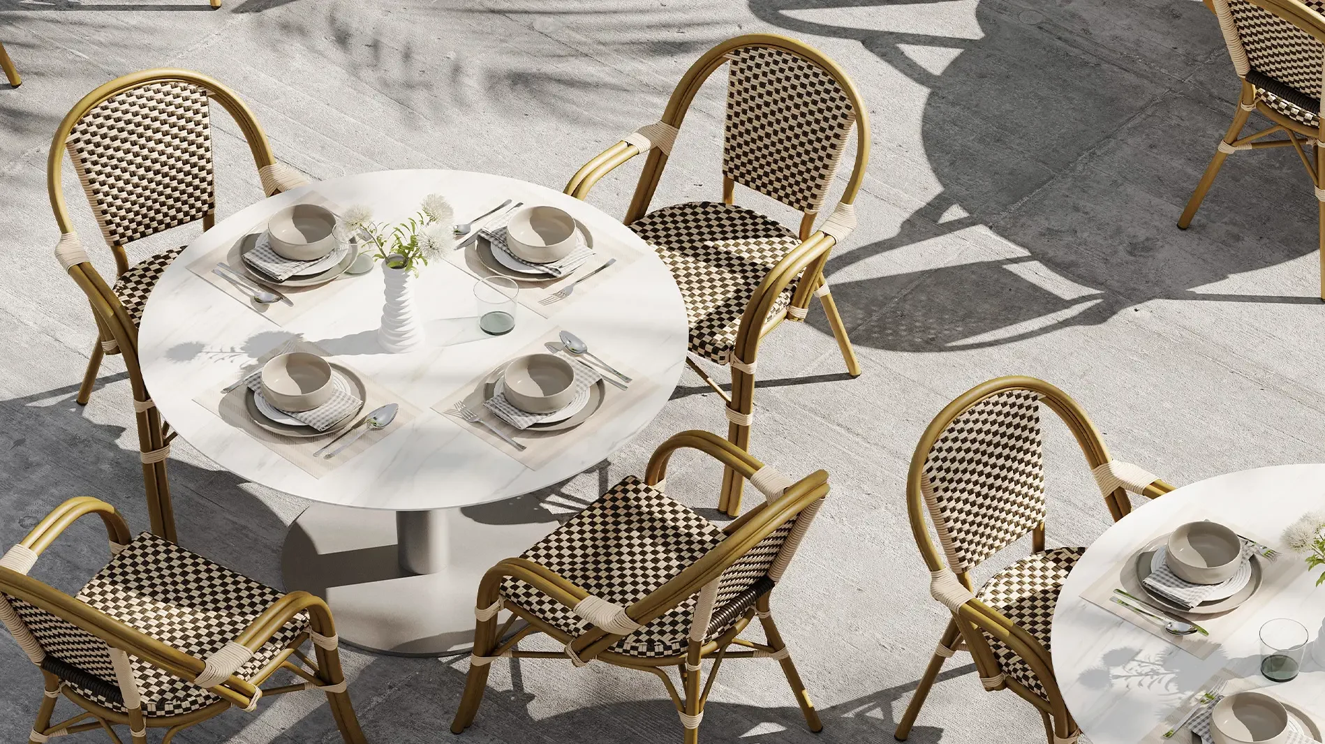 Aria Loveseat by DecoScape placed in a lush residential garden setting - DecoScape