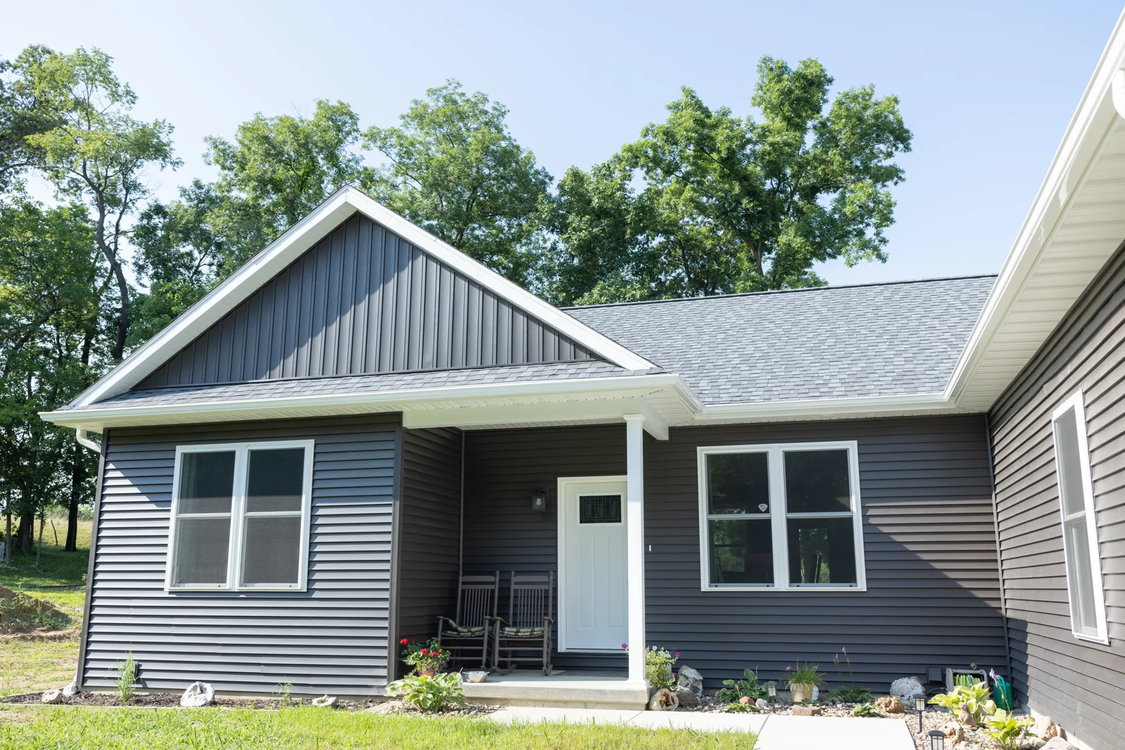 A stunning custom primary suite addition featuring high-end architectural finishes