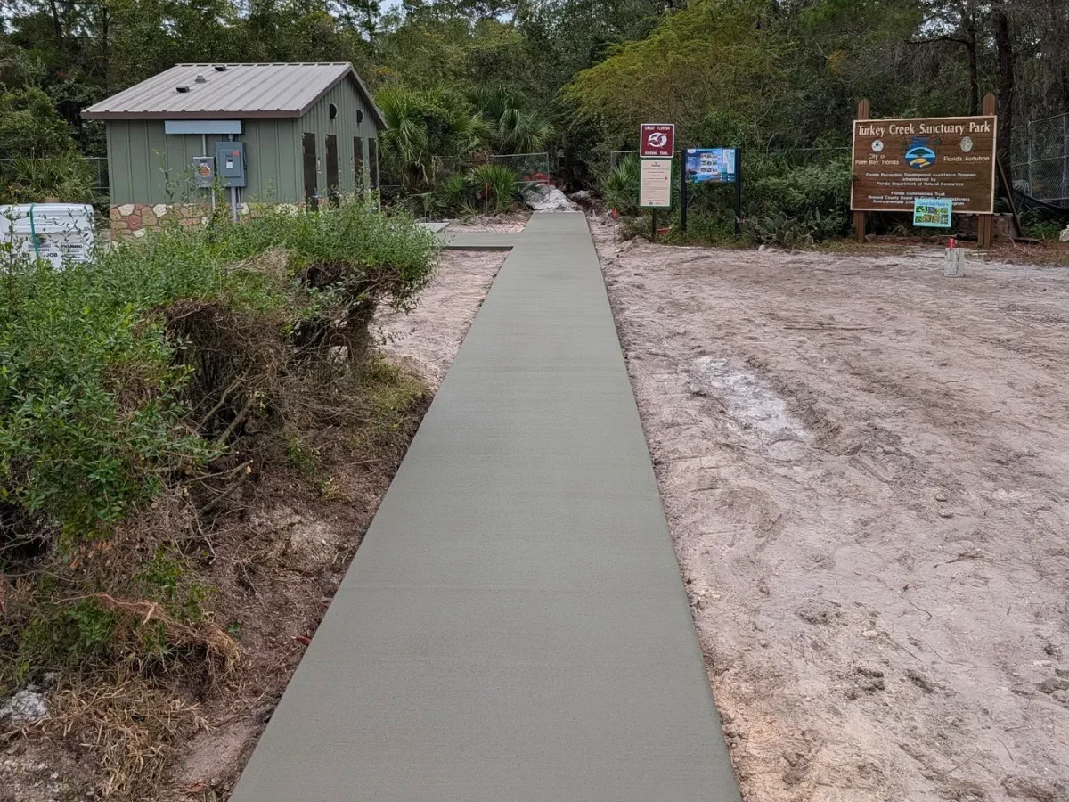 newly poured concrete sidewalk at Turkey Creek Sanctuary Park in Palm Bay, FL