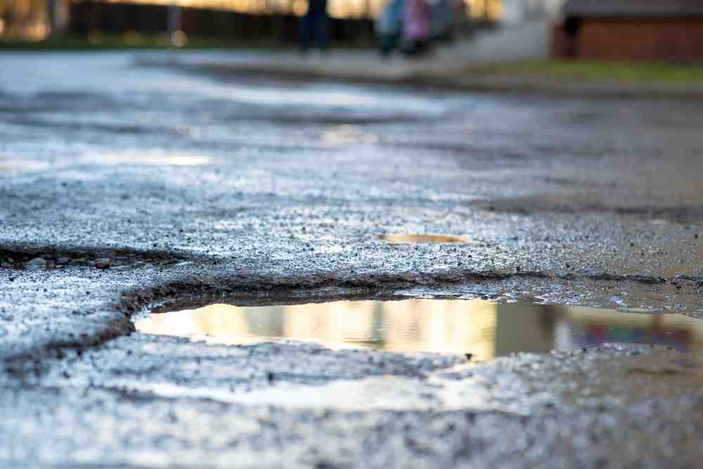 Detailed infographic showing types of wheel damages caused by potholes, including bent rims, tire punctures, and misalignment. - how potholes affect wheels infographic pillar-3-steps