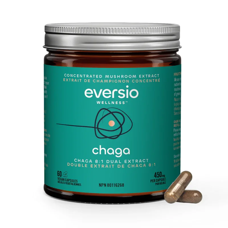 Front view of the Chaga supplement jar and two vegan capsules, detailing the potent mushroom health facts about dual extract benefits, rich in natural antioxidants.