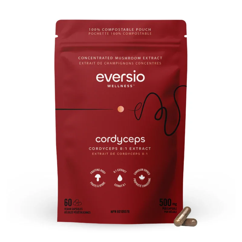 A red compostable pouch of Cordyceps 8:1 extract with two capsules, showing a high-potency mushroom daily dose for energy.