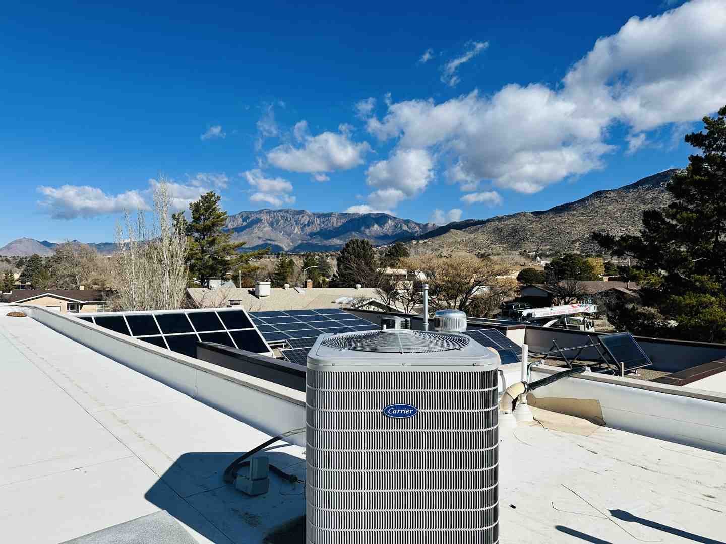 A collage of heating system components, including a modern high-efficiency furnace, the outdoor unit of a heat pump, a ductless mini-split indoor head unit, and a high-efficiency boiler - efficient heating system albuquerque nm