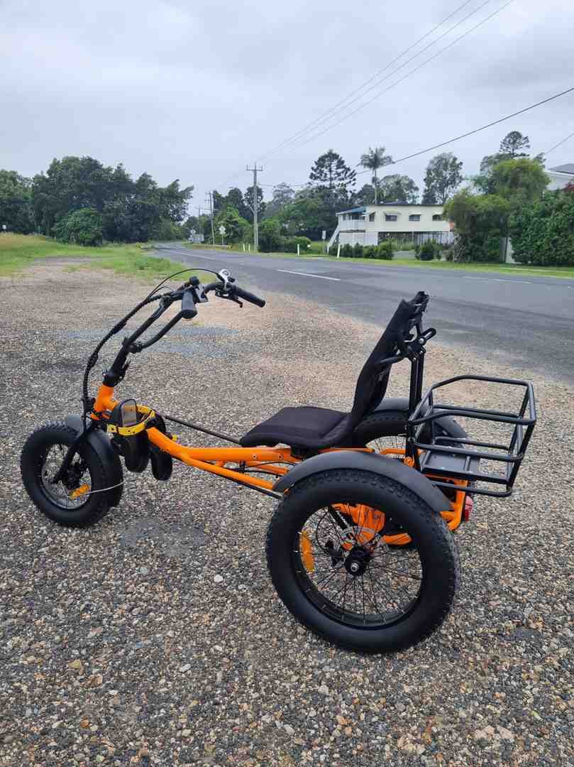 Trident FT (Fat Tyre) model on a scenic gravel rail trail - semi-recumbent e-trike Trident FT (Fat Tyre) model on a scenic gravel rail trail - semi-recumbent e-trike