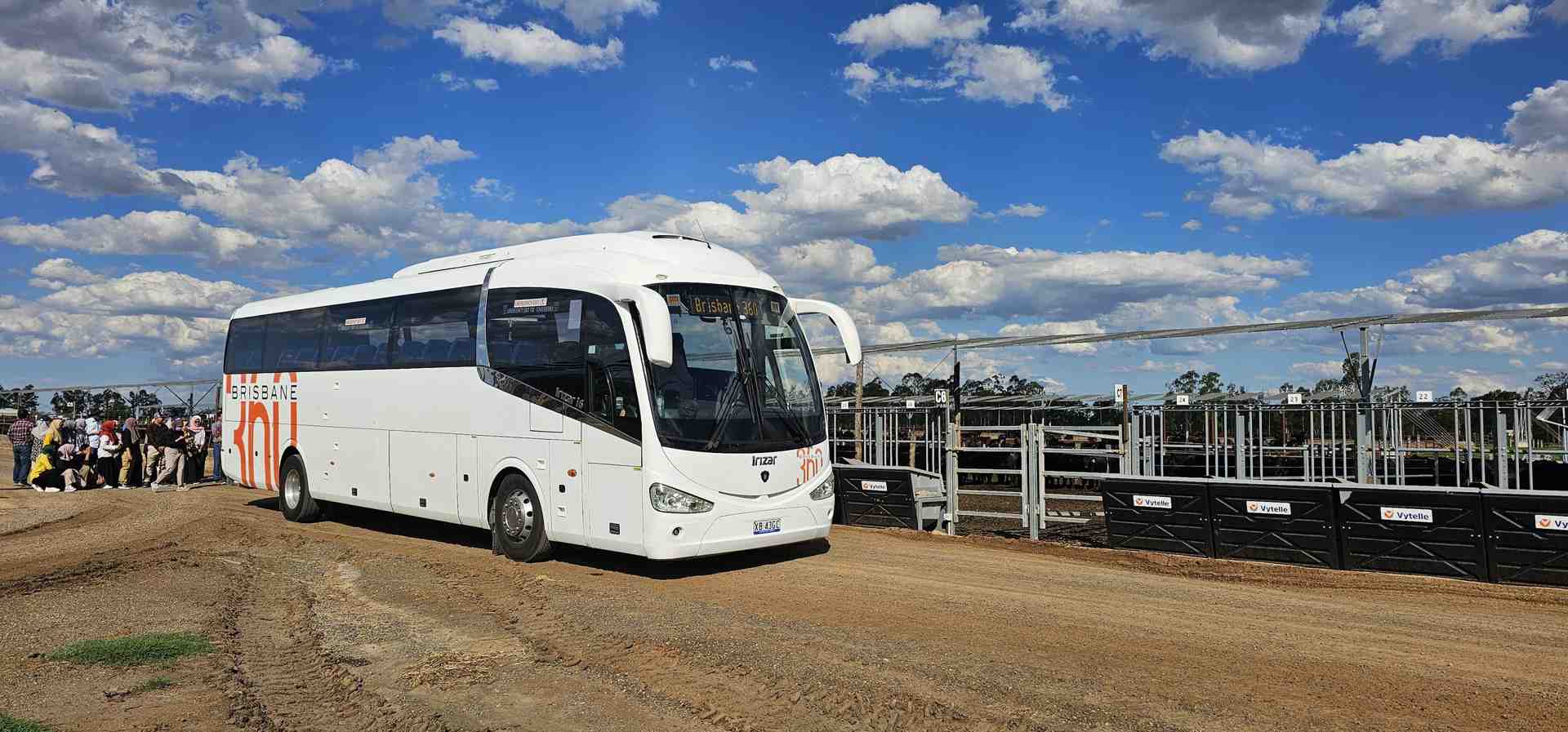 Interior view of luxury coach showing reclining leather seats, climate control, and passenger amenities - rent a tour bus with driver