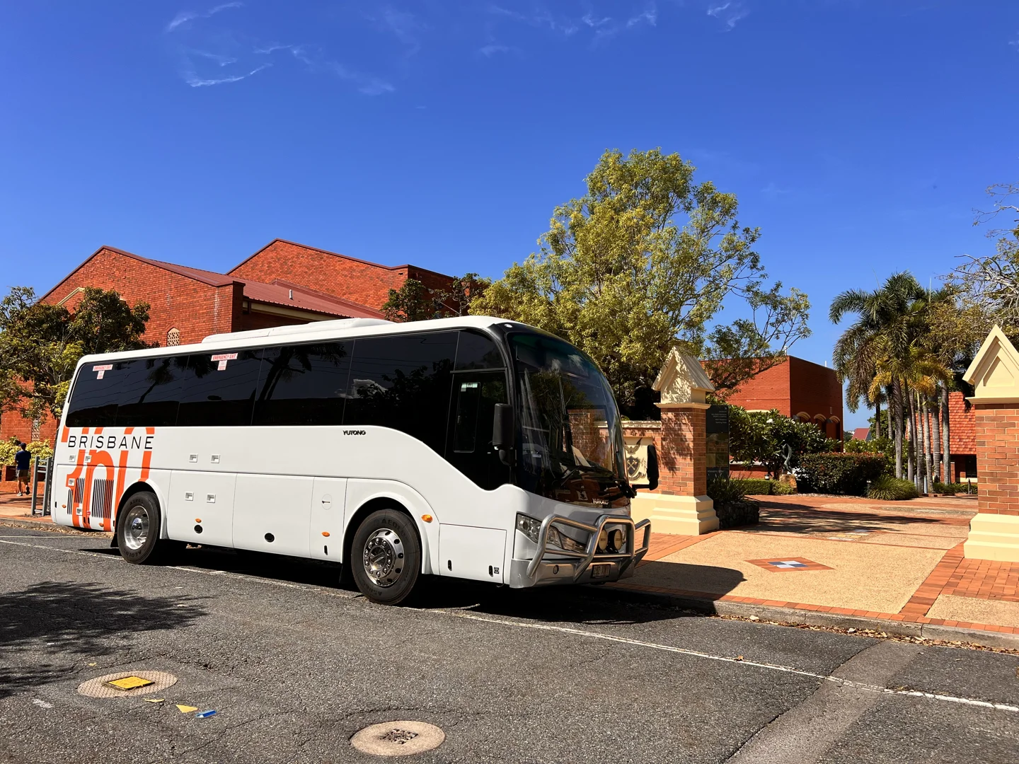 Passenger coach arriving at stadium coach parking zone