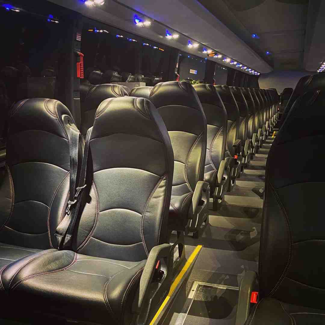mid-size coach with reclining seats interior - bus hire brisbane