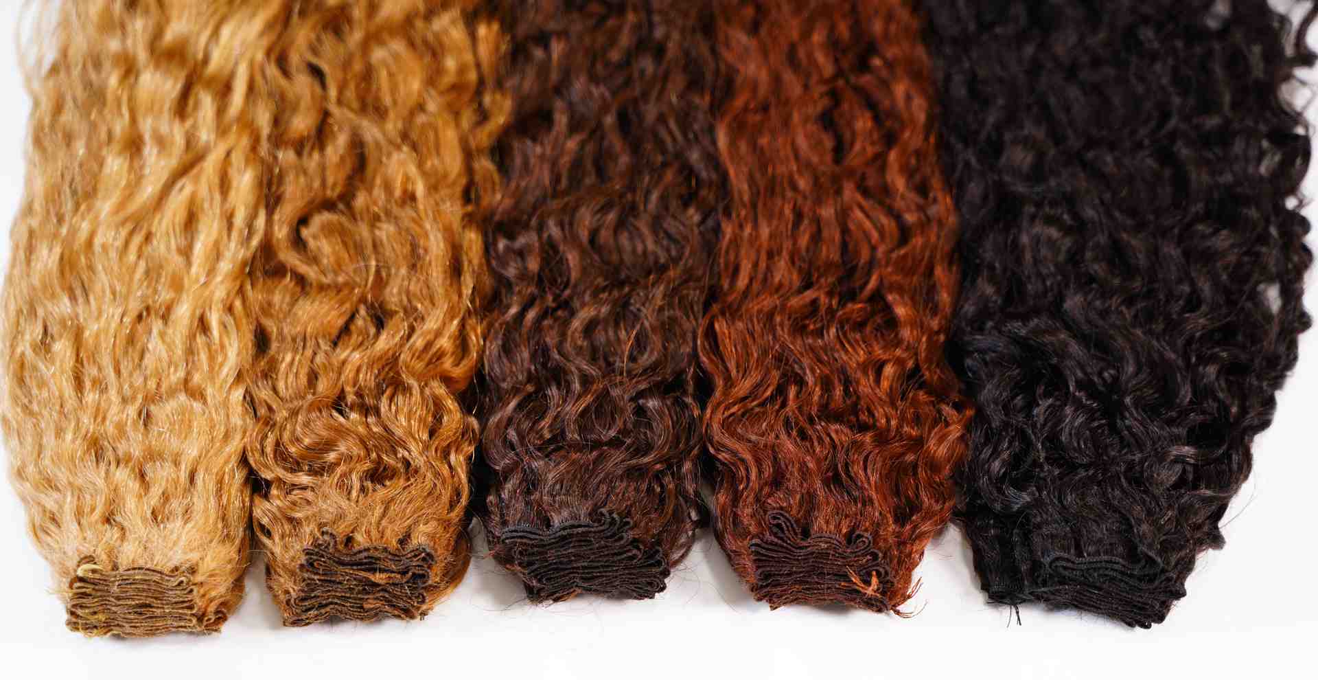 premium hand tied weft hair extensions showing various textures and colors - hand tied weft hair extensions