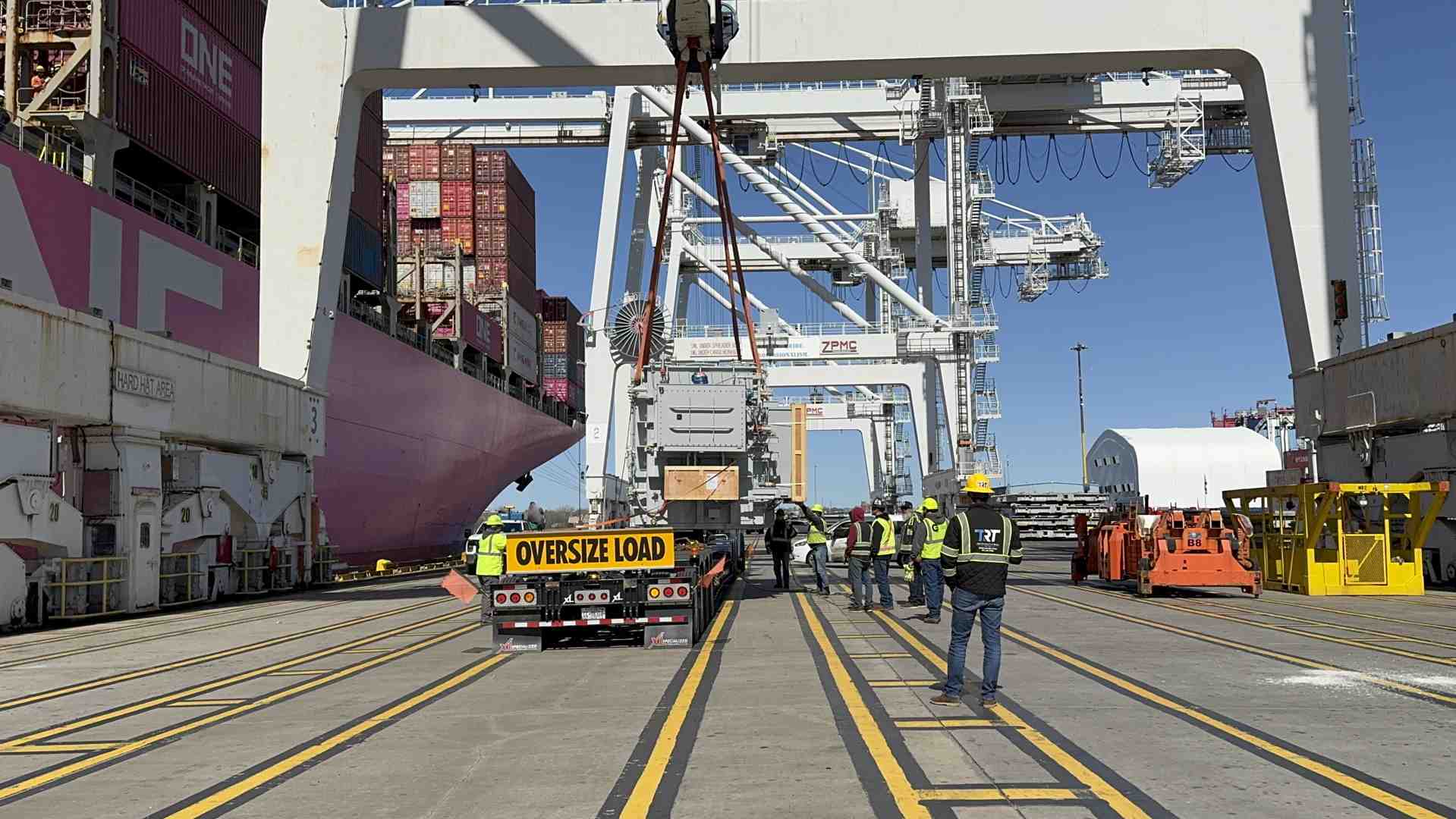 flat rack container with oversized machinery - shipping large containers