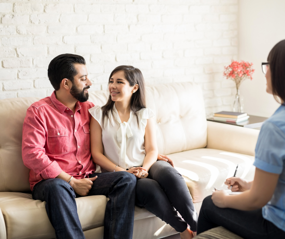 diverse group of couples in a workshop setting - pre-marriage counseling denver