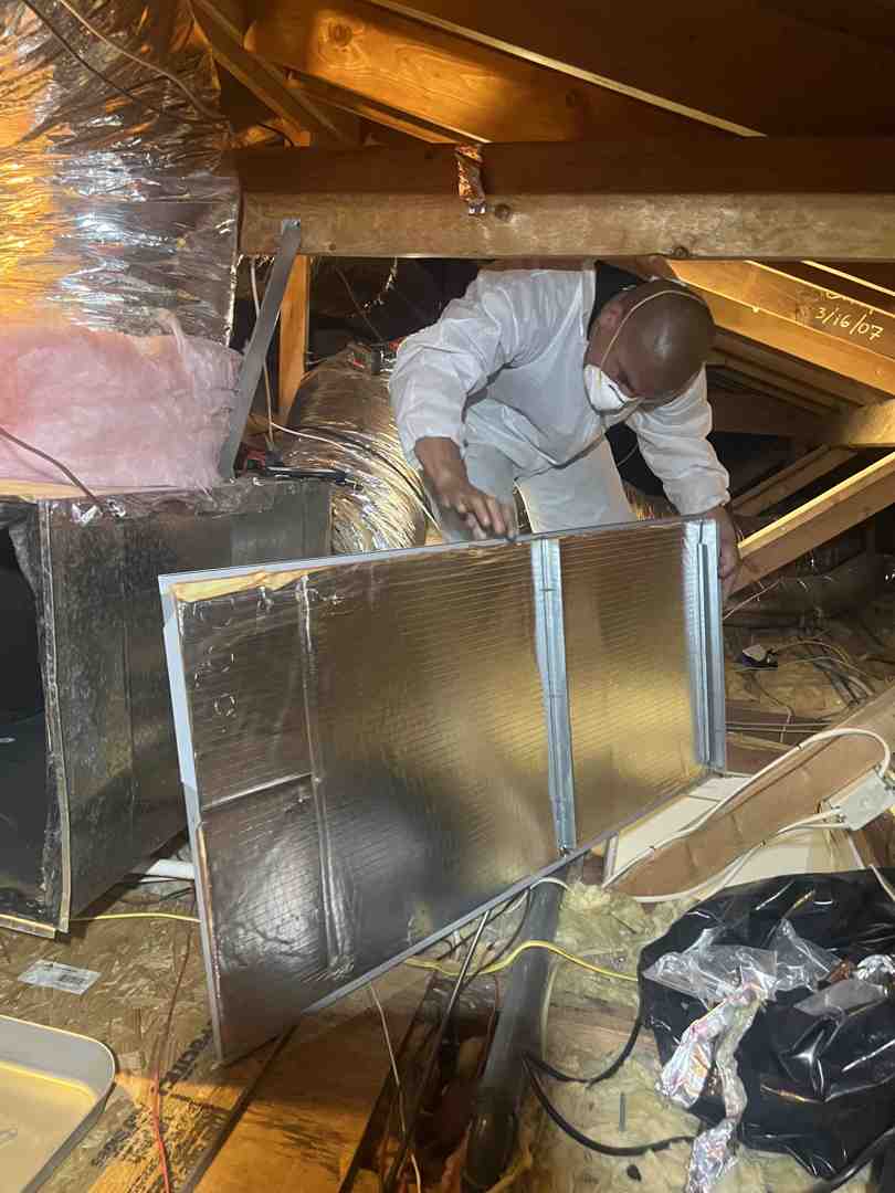 technician performing a blower door test - home air sealing newbury park ca