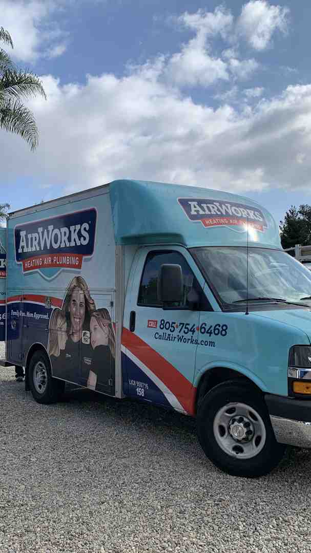 licensed electrician working on transfer switch panel - backup generator installation camarillo ca