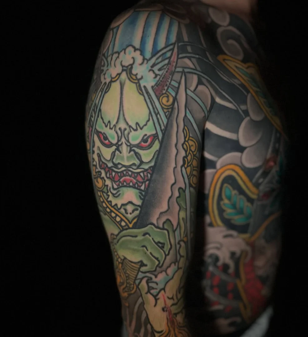 Tattoo artist creating a custom Japanese design in Sydney. Tattoo artist creating a custom Japanese design in Sydney.