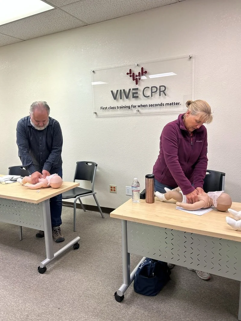 Pediatric CPR training on infant manikin