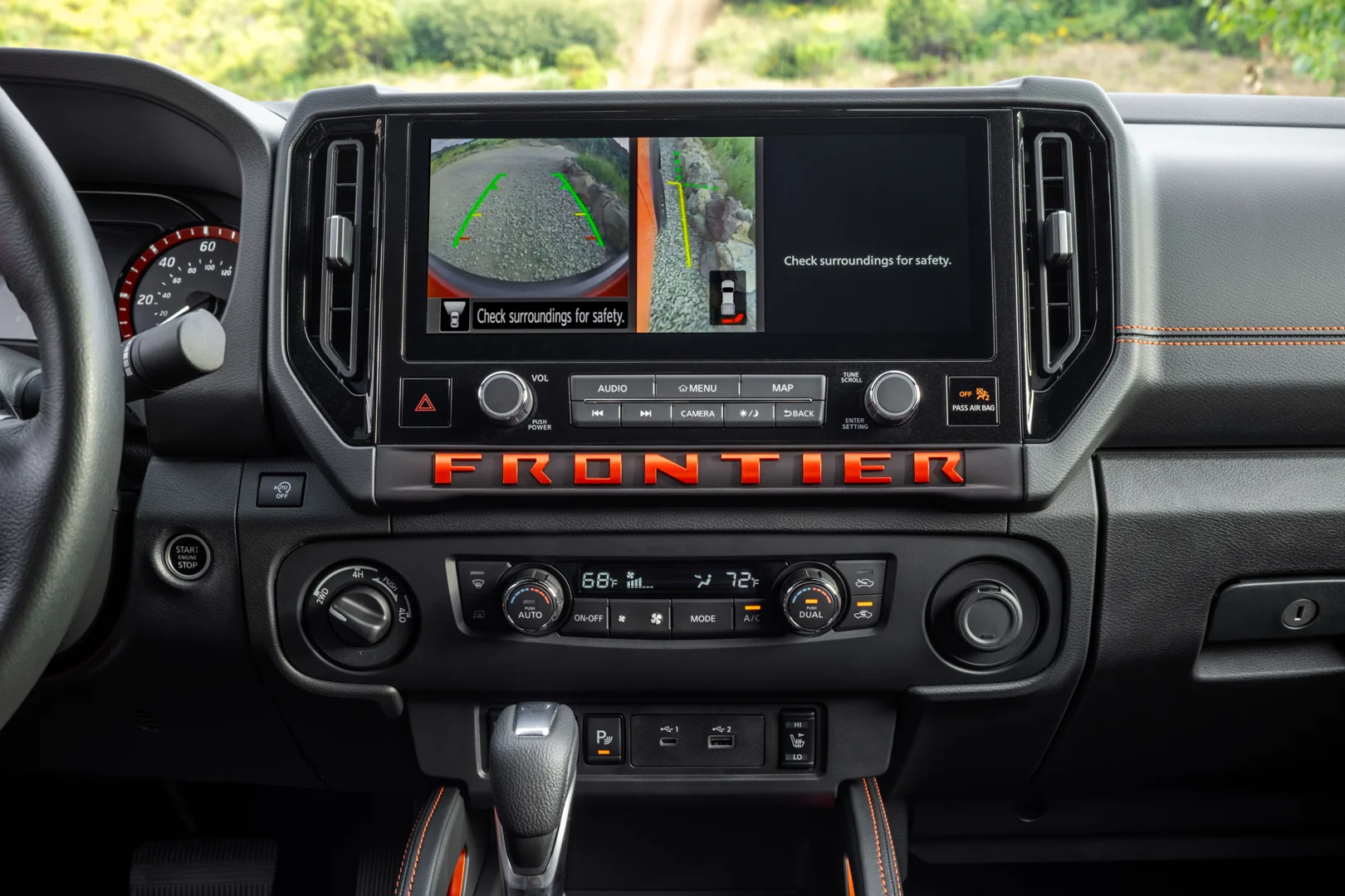 Nissan driver-assist safety interface showing Blind Spot and Emergency Braking warnings