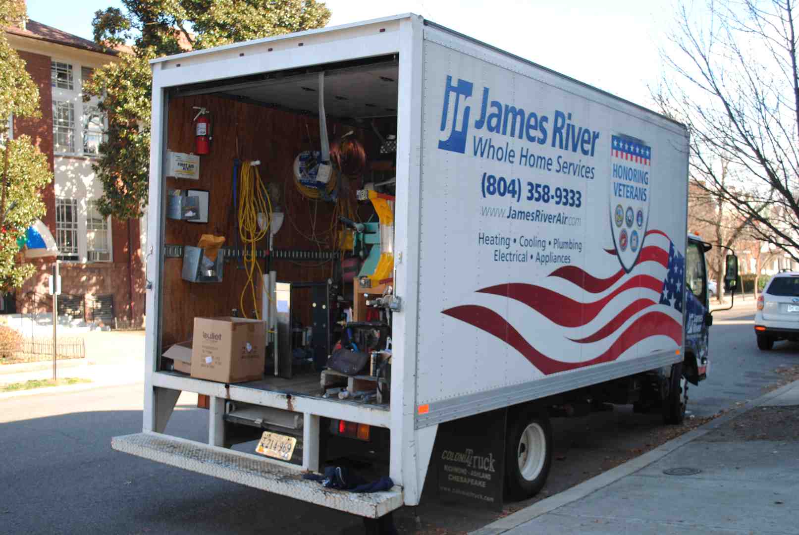 James River Air Conditioning service van in a suburban neighborhood - heating installation in glen allen, va