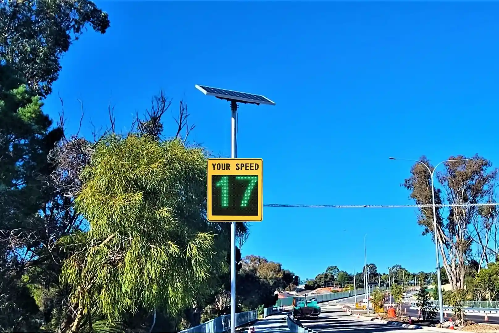 RoadSmart Plus Speed Radar Sign alerting traffic in a school zone - solar lights