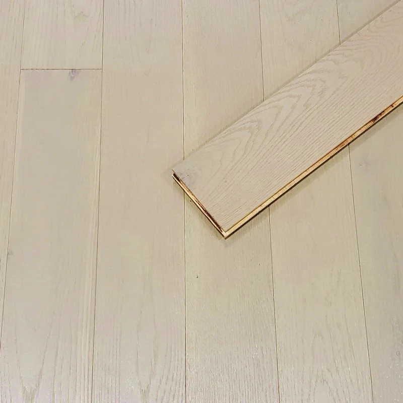 Close-up of wire-brushed hickory showing rich grain and matte UV lacquer finish