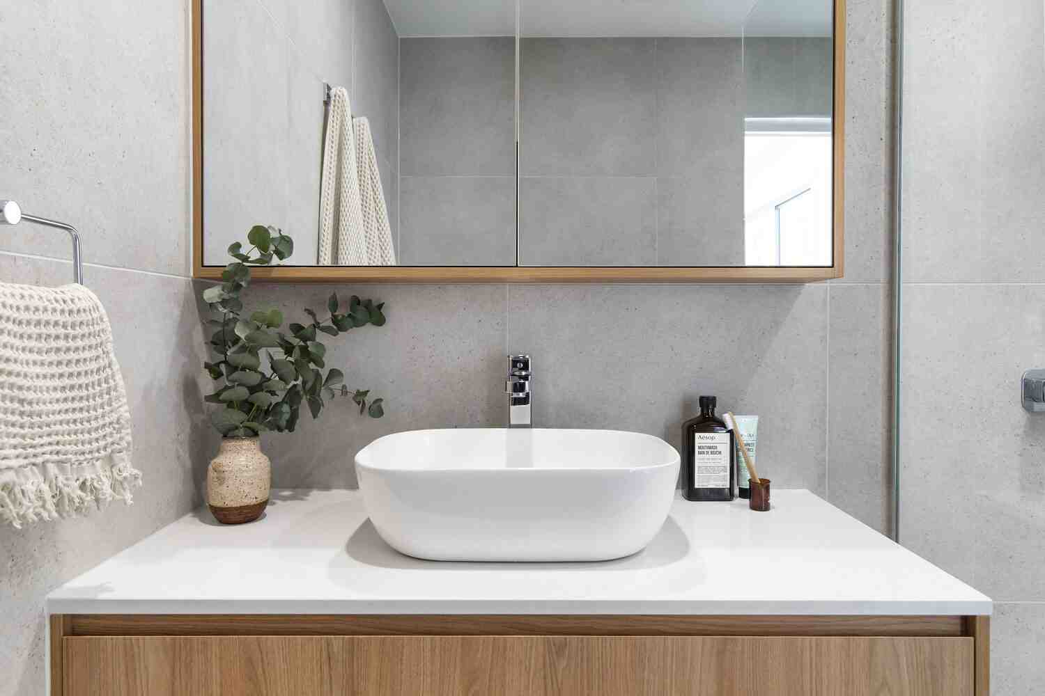 Aroona Avenue Buddina project showcasing accessible bathroom design with custom vanity and premium finishes