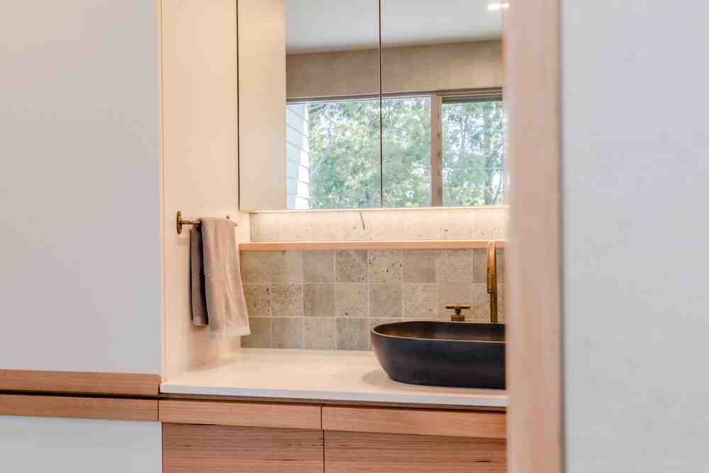 Statistics showing that 80% of home falls occur in bathrooms, with comfort-height toilets reducing strain by 40% and grab bars preventing 37% of bathroom falls, alongside cost-benefit analysis of accessibility modifications - small bathroom remodel for elderly infographic 