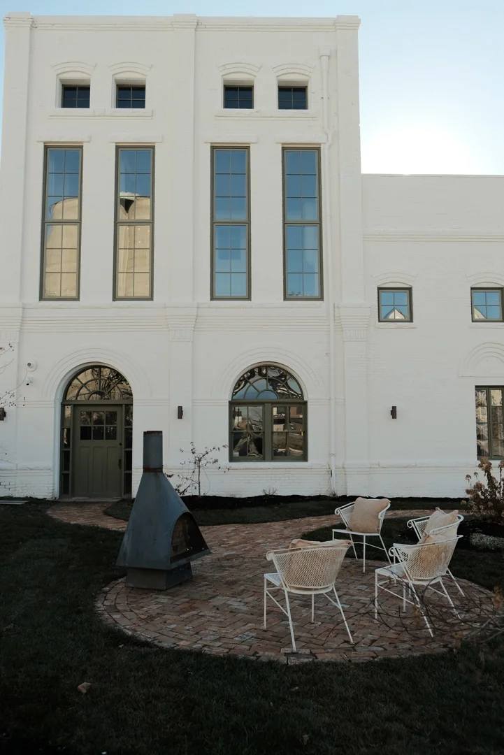 A community courtyard featuring biophilic elements, seating areas, and natural light to promote resident wellbeing