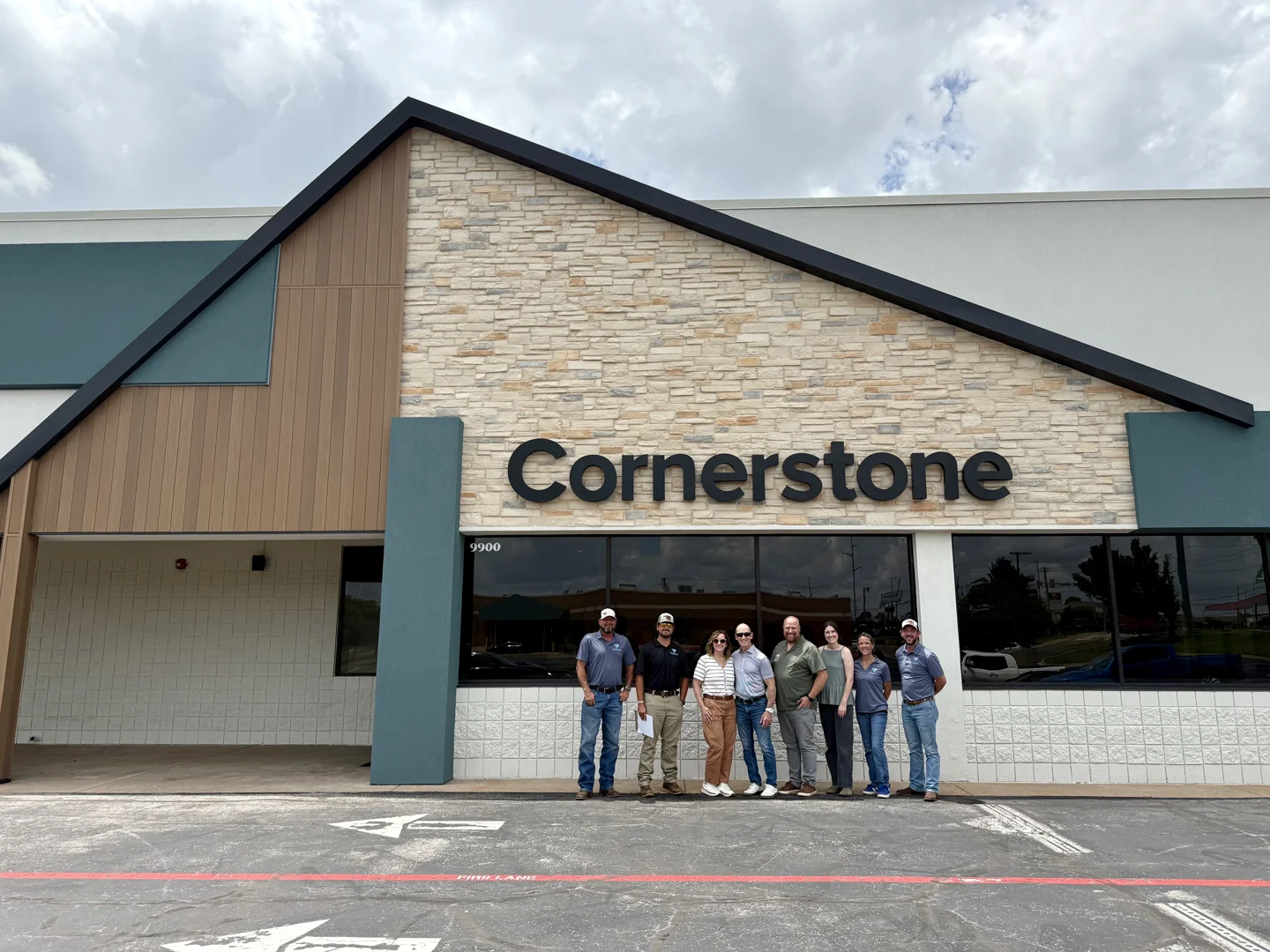Cornerstone building exterior with modern green and tan accents, symbolizing long-term client relationships. Cornerstone building exterior with modern green and tan accents, symbolizing long-term client relationships.