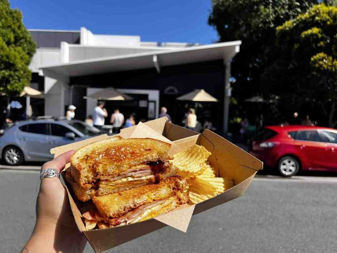 Freshly prepared cafe sandwich on artisan sourdough at Flinders Lane Cafe