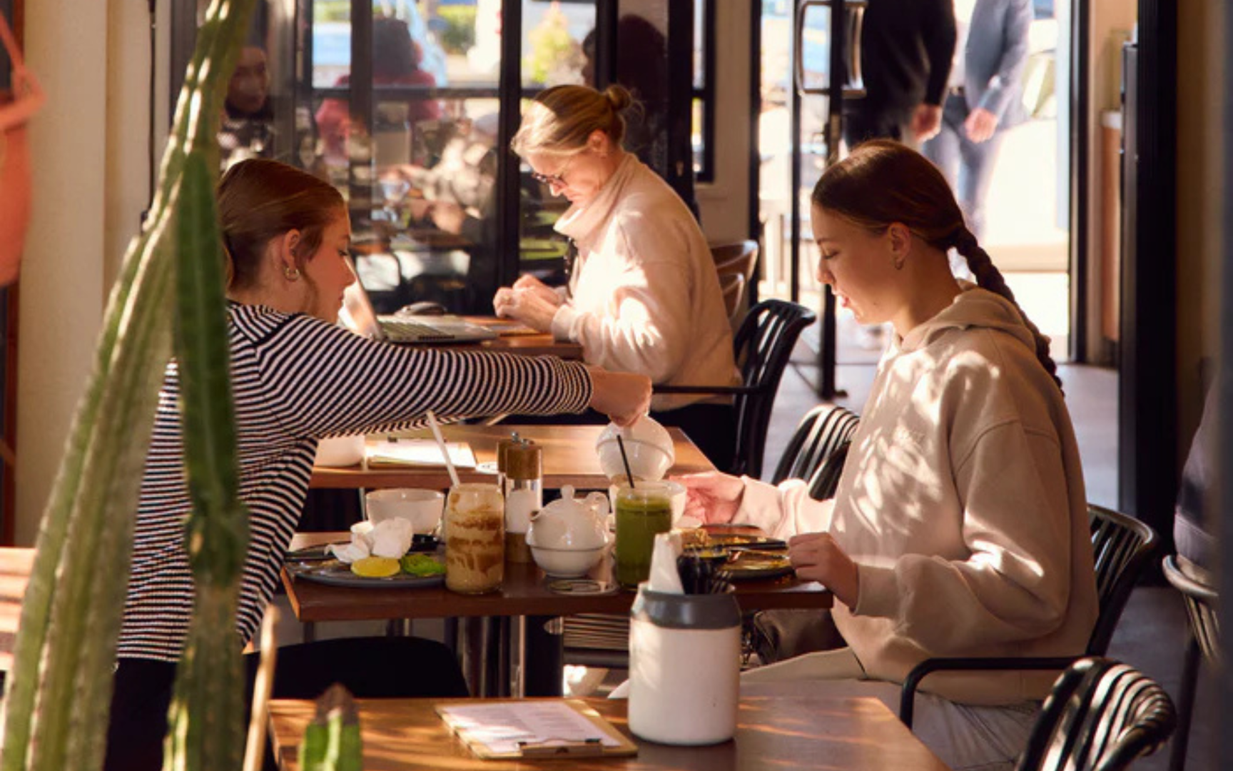 The cafe's welcoming interior in the early morning light - Breakfast open early