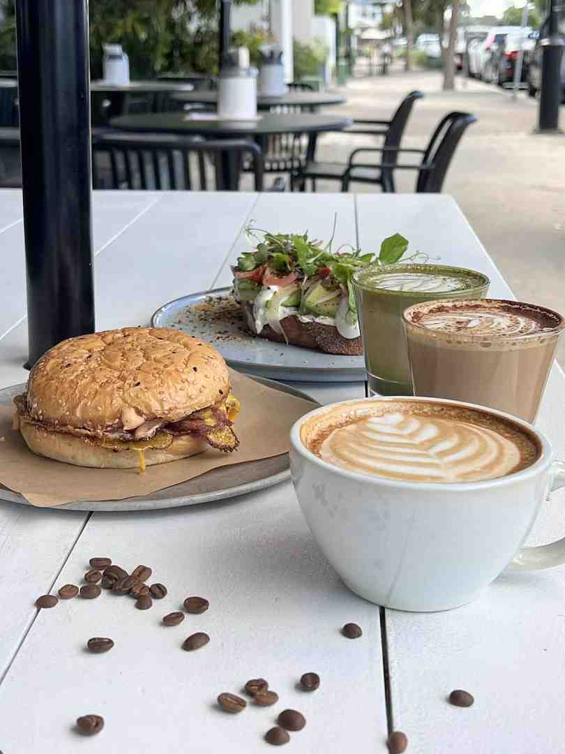 Breakfast sandwich and coffee at Flinders Lane Cafe, a top choice for cafes open early in Maroochydore.