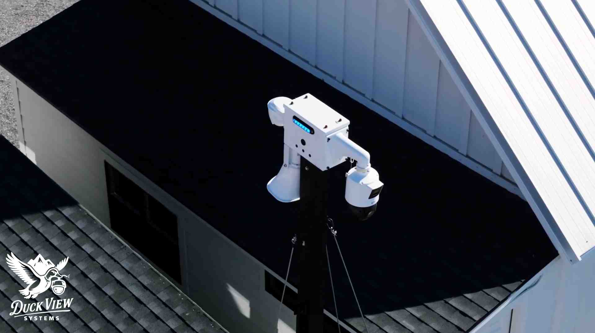 AI-Powered Mobile Surveillance Camera System AI-powered mobile surveillance camera mounted on a rooftop, providing real-time security monitoring for outdoor and industrial sites.