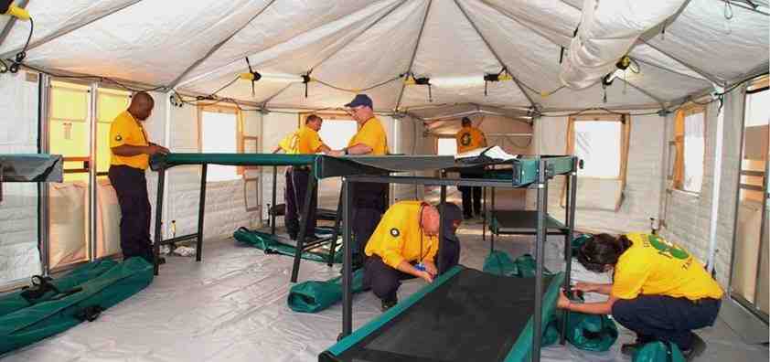 rugged work light being used in a dusty and wet industrial environment - Portable work light