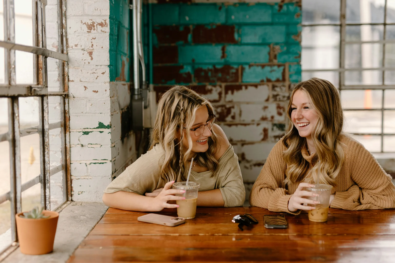 two people having coffee and smiling - Coping with isolation two people having coffee and smiling - Coping with isolation