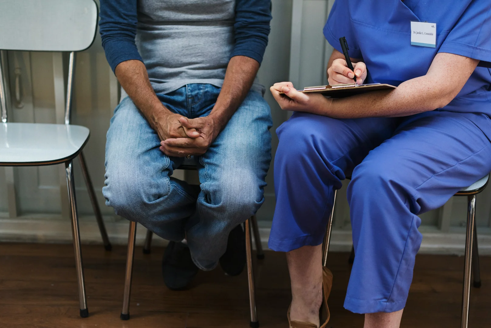 doctor and patient in a medical setting - English speaking services