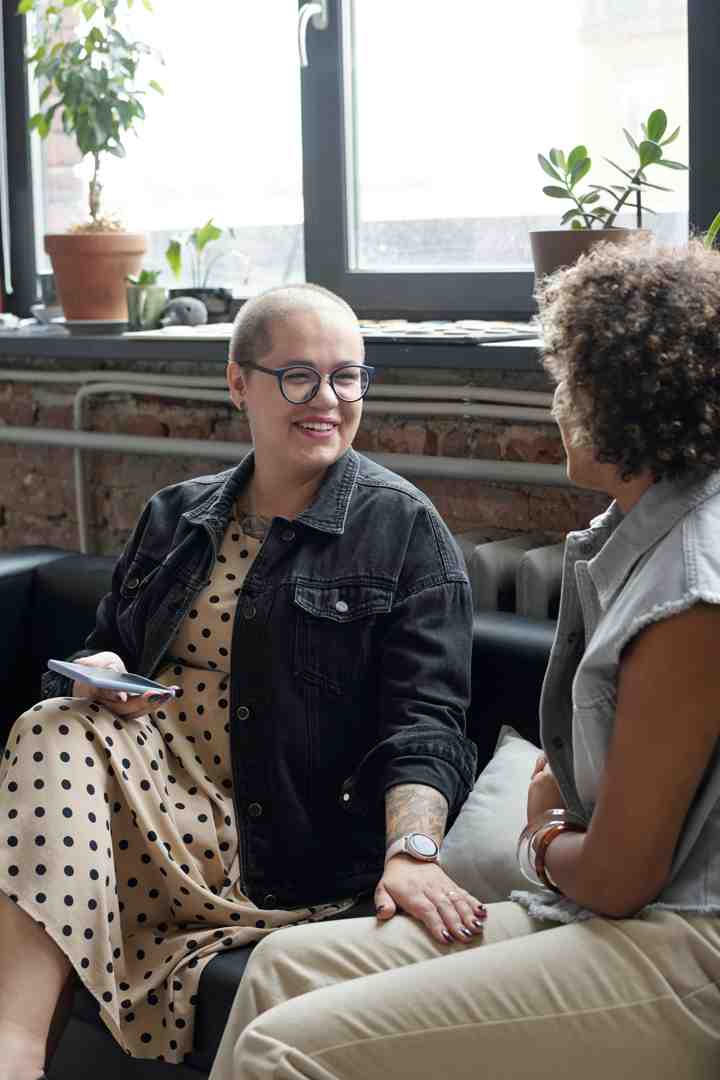 two people having a serious but caring conversation over coffee - benefits of friends with benefits