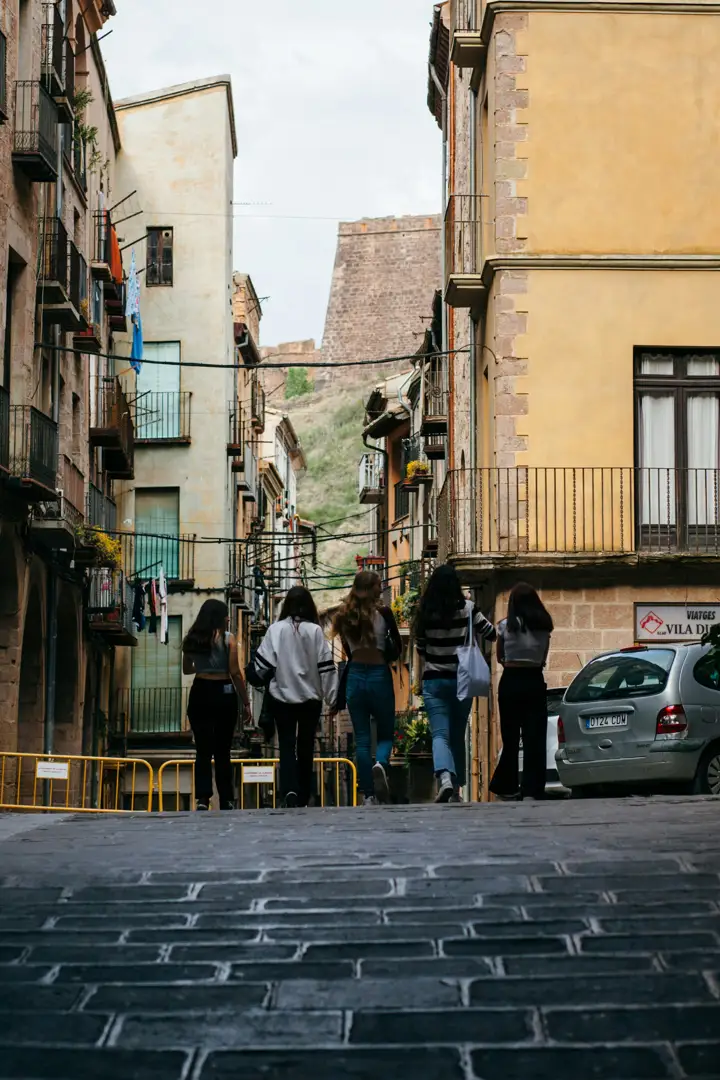 A diverse group of friends walking down Spainish streets - Therapy for Americans Living In Spain A diverse group of friends walking down Spainish streets - Therapy for Americans Living In Spain