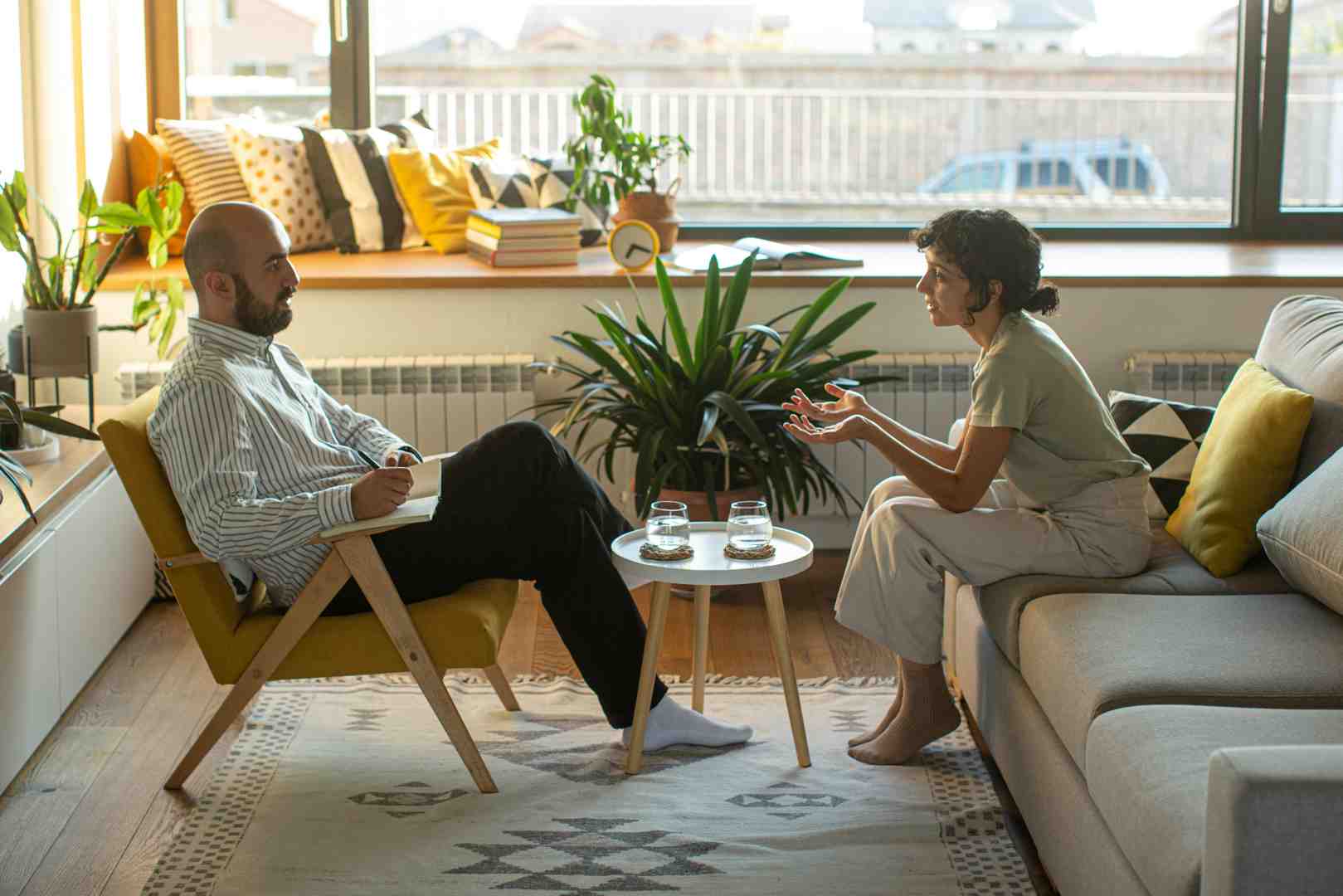 therapy session in modern office - therapy for high achievers therapy session in modern office - therapy for high achievers