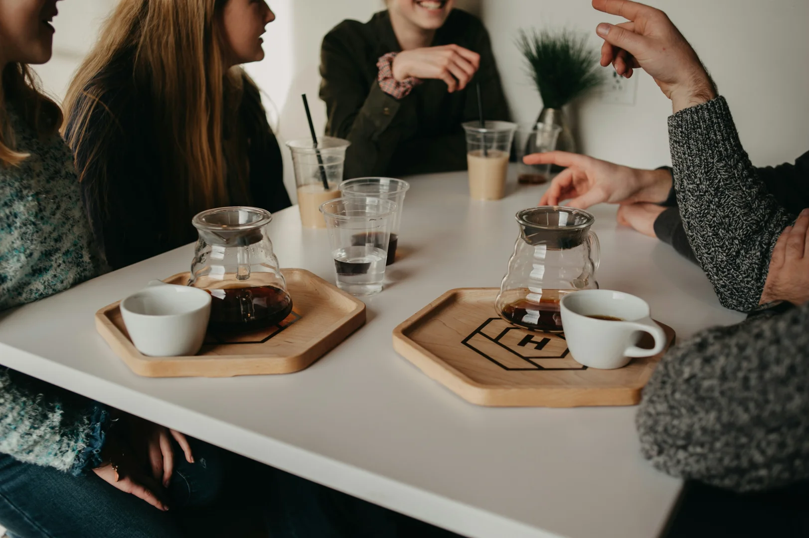 people having coffee, with a subtle visual cue showing a blurred boundary - client therapist relationship ethics