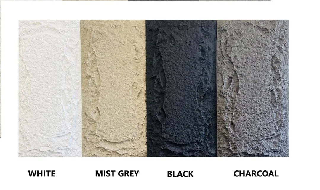 A color palette for external wall stone cladding featuring White, Mist Grey, Black, and Charcoal textured finish options.